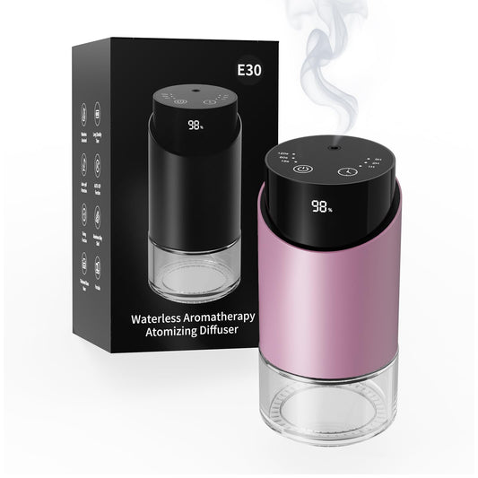 Pink waterless essential oil diffuser close-up with nano mist