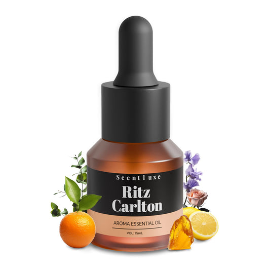 Glass dropper bottle of waterless diffuser oil with orange-musk Ritz-Carlton-inspired scent (15ml).