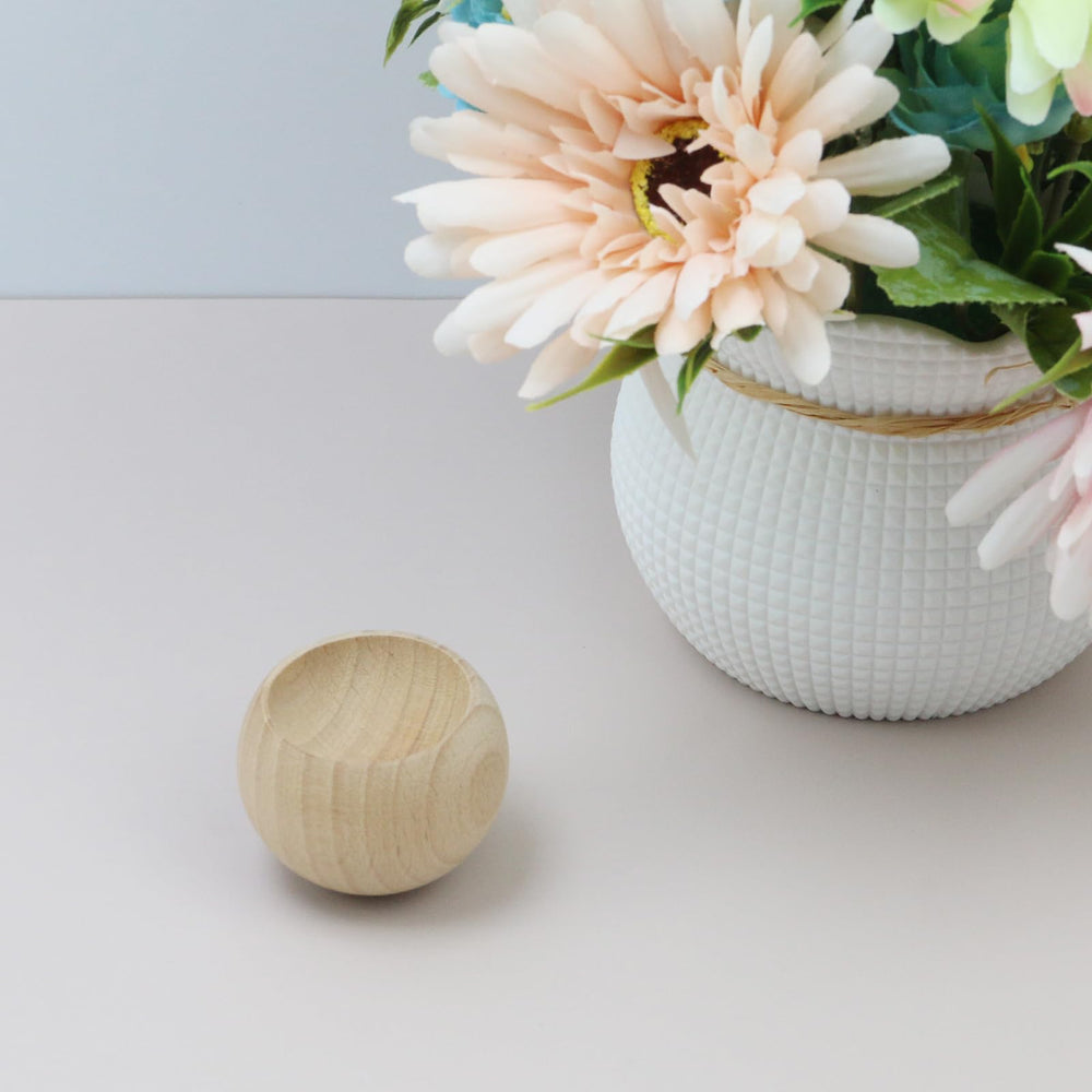Wealrit egg-shaped diffuser, top view, showcases natural finish for aroma diffusion