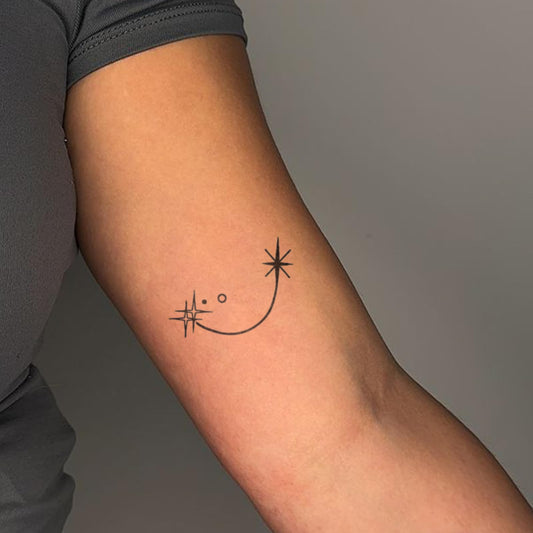 WEEKINK Capricorn glyph tattoo detail highlighting bold symbol and stylish design