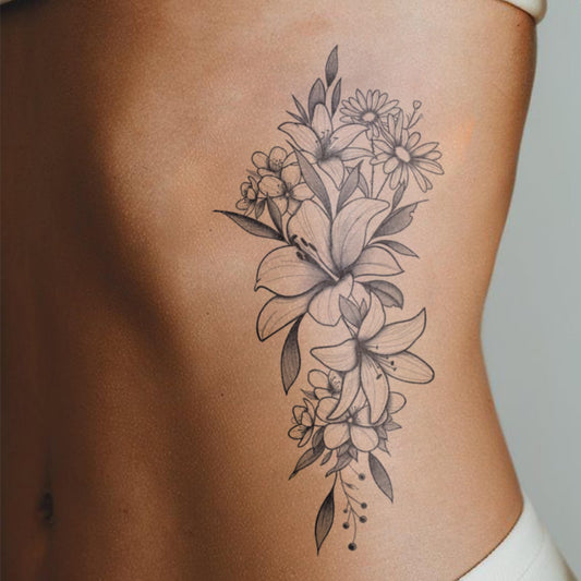 WEEKINK lily-sunflower tattoo on shoulder; realistic, minimalist lines