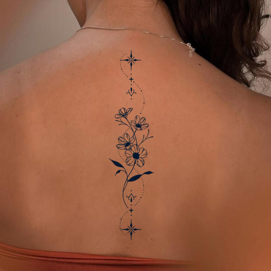 Weekink Spine Flower Tattoo vertical design along the spine for elegant balance.