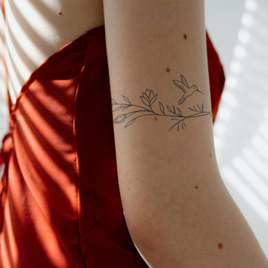 WEEKINK Vine Branch wrap tattoo on ankle for subtle botanical charm