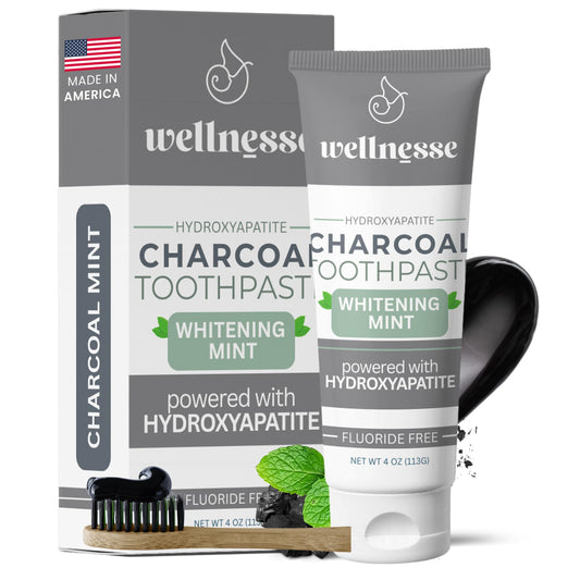 Front view of Wellnesse Activated Charcoal Toothpaste 4 oz pack