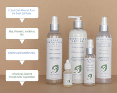 Hand spritz of White Egret Magnesium Oil Spray showing mist texture
