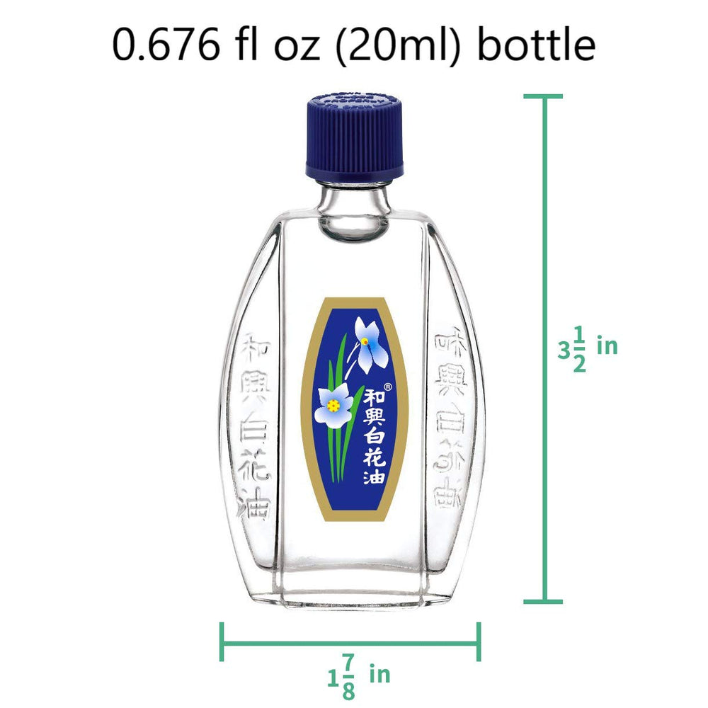 Box packaging and bottle of White Flower analgesic balm oil