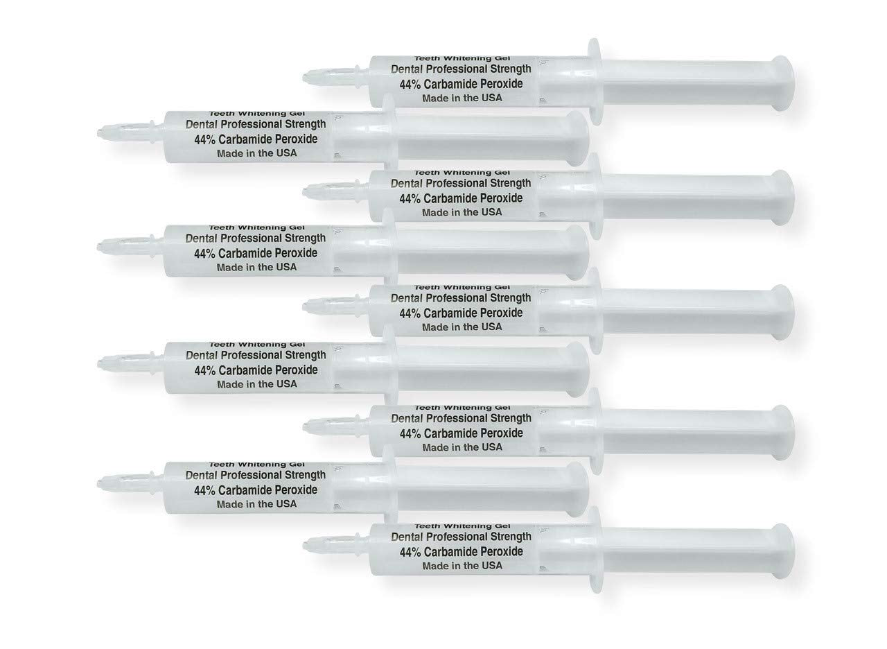 White Teeth Global 44% carbamide peroxide teeth whitening gel kit with 10 syringes, 2 trays, and a shade guide.