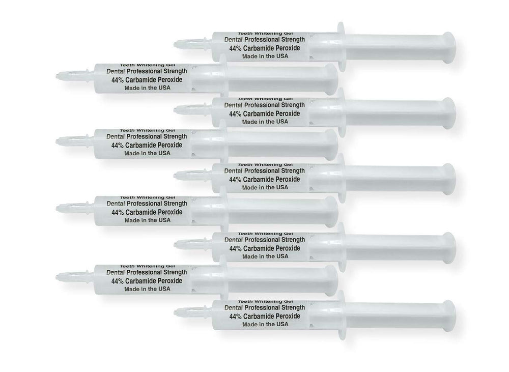 White Teeth Global 44% carbamide peroxide teeth whitening gel kit with 10 syringes, 2 trays, and a shade guide.