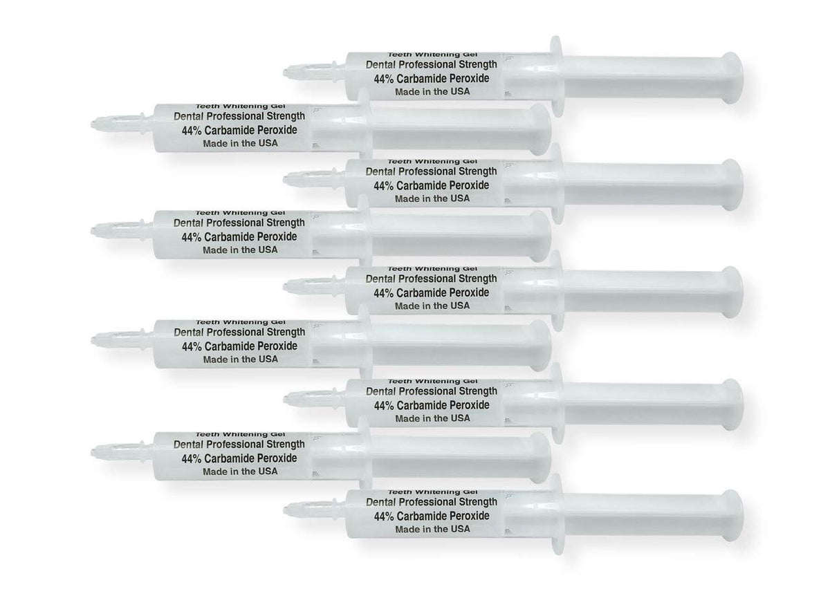 White Teeth Global 44% carbamide peroxide teeth whitening gel kit with 10 syringes, 2 trays, and a shade guide.