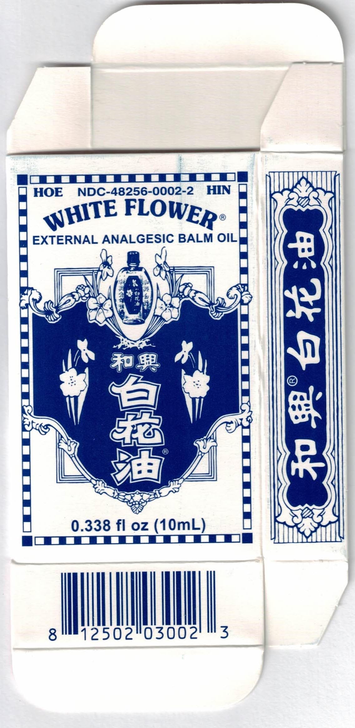 Lifestyle shot of White Flower Balm Oil on a clean surface