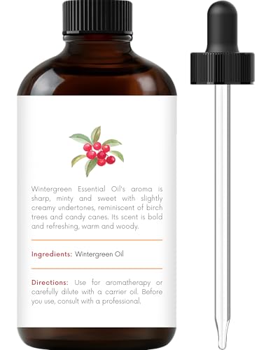 Wintergreen essential oil in diffuser for aromatherapy
