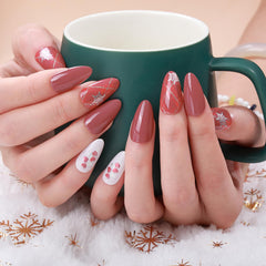 Winthrop snowflake and tree pattern nail wraps for holiday nails.