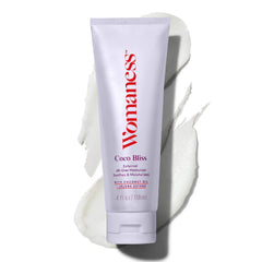 Womaness Coco Bliss bottle with pour supports easy daily moisturization for intimate skin.