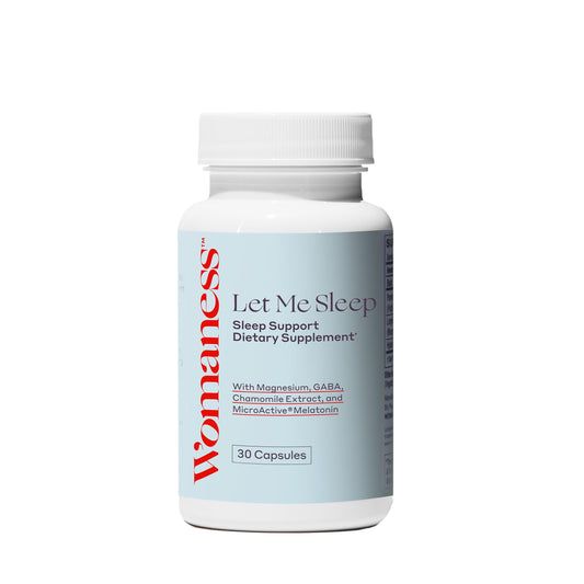 Bottle of Womaness Let Me Sleep supplements with label visible