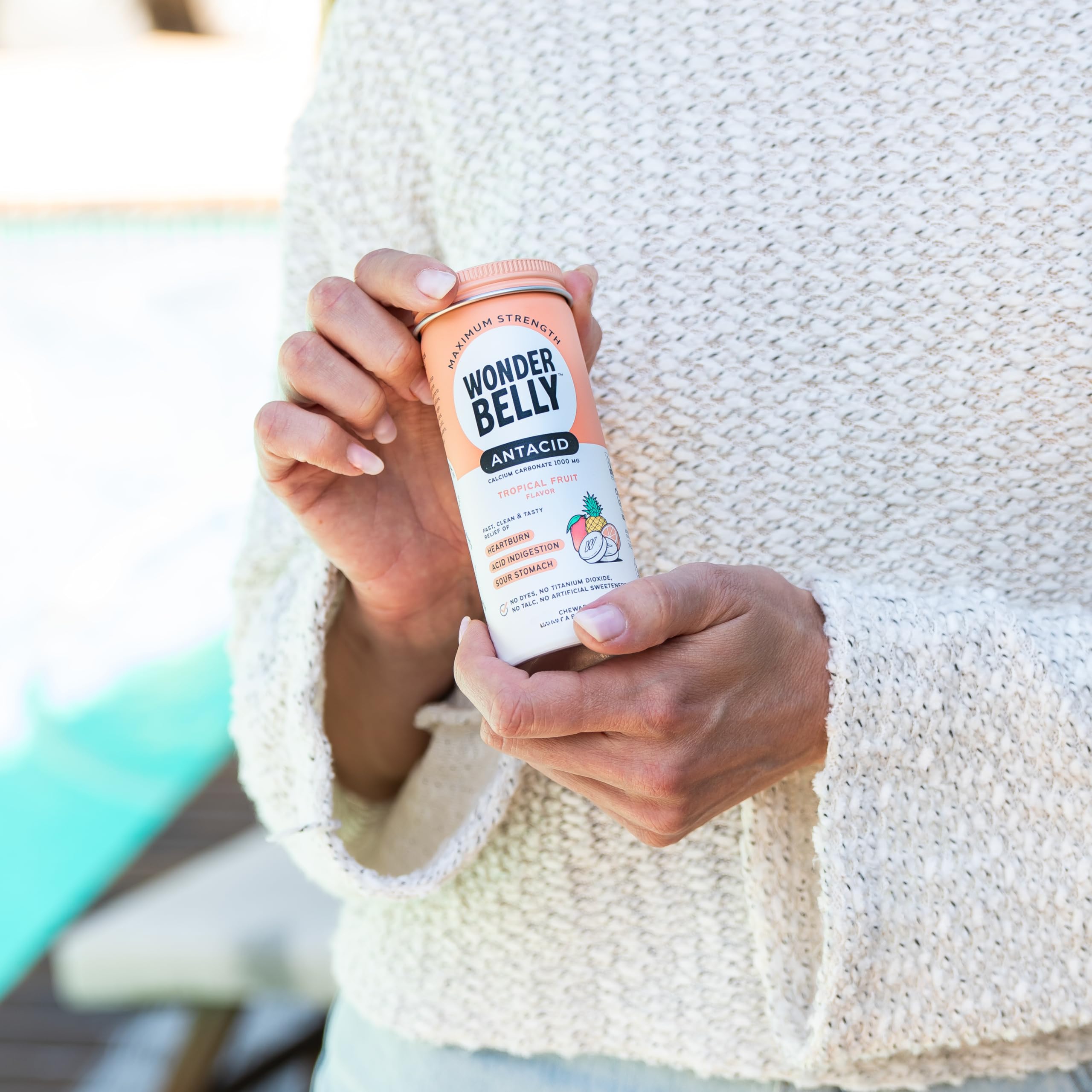 Wonderbelly bottle recycling symbol emphasizes eco-friendly packaging.