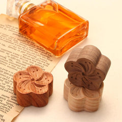 Minimalist flower-shaped wooden diffuser as home decor