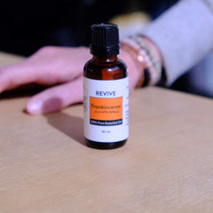 Diffuser releasing a woodsy aroma with Frankincense oil