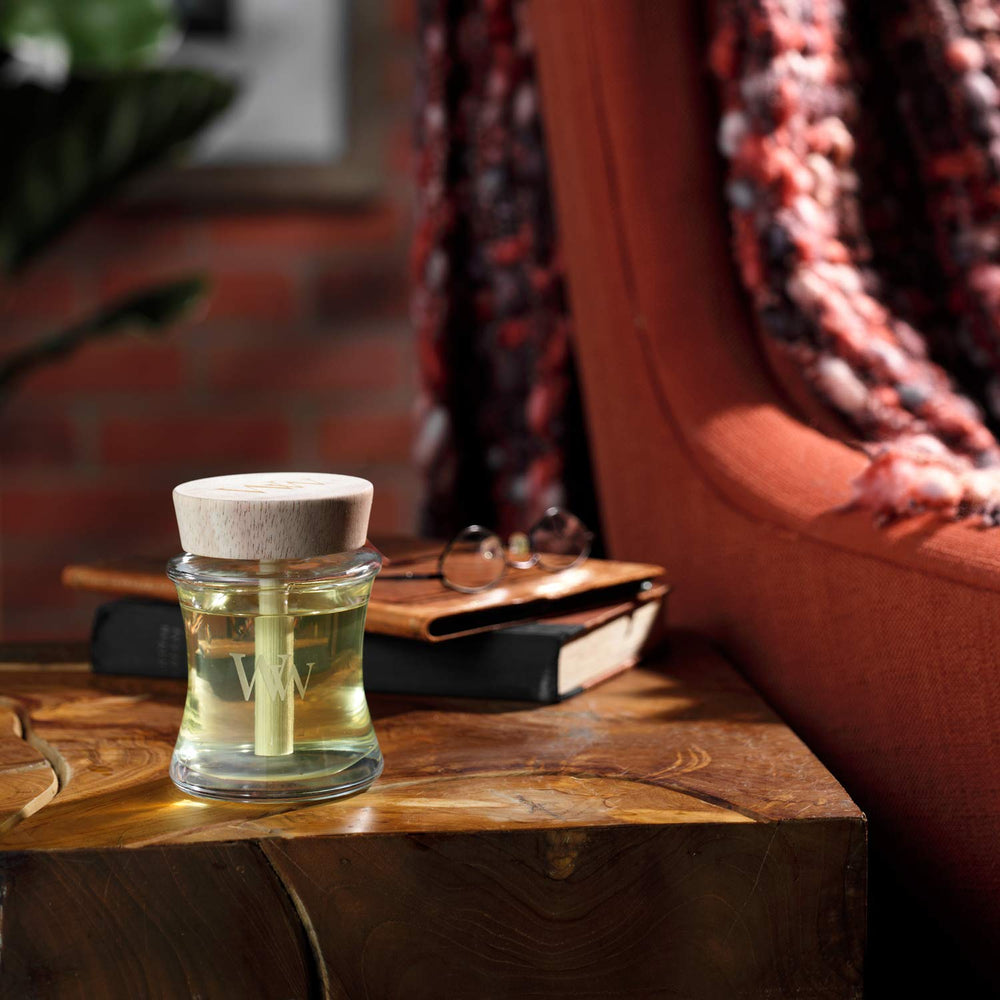 WoodWick Spill-Proof Diffuser 148 ml bottle shown on decorative shelf