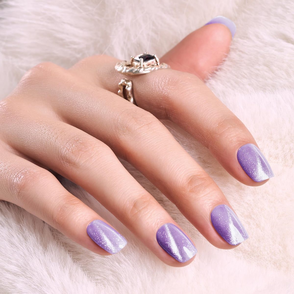 Wooyas cat eye press-on nails in short purple with cat-eye shimmer for easy at-home style.
