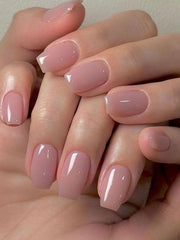 Wooyas nude pink press-on nails in short square shape for quick salon-like results.