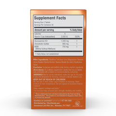 Close-up of bottle label highlighting Glucosamine 1500mg on X Ray Dol