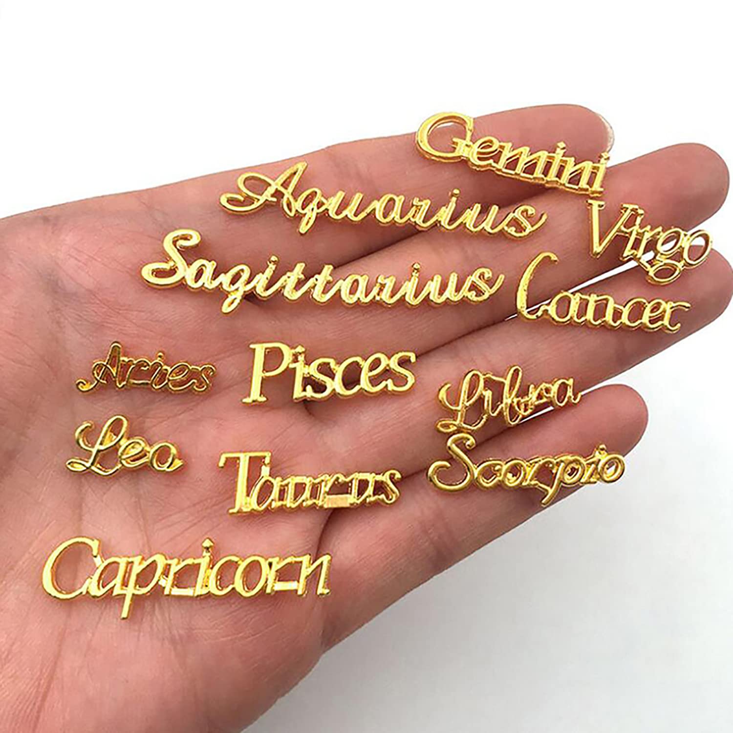 Multipurpose XEAOHESY zodiac charms suitable for nails and other surfaces.