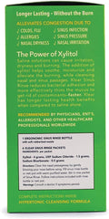 Xlear bottle in use during morning routine for refreshed airways and comfort.