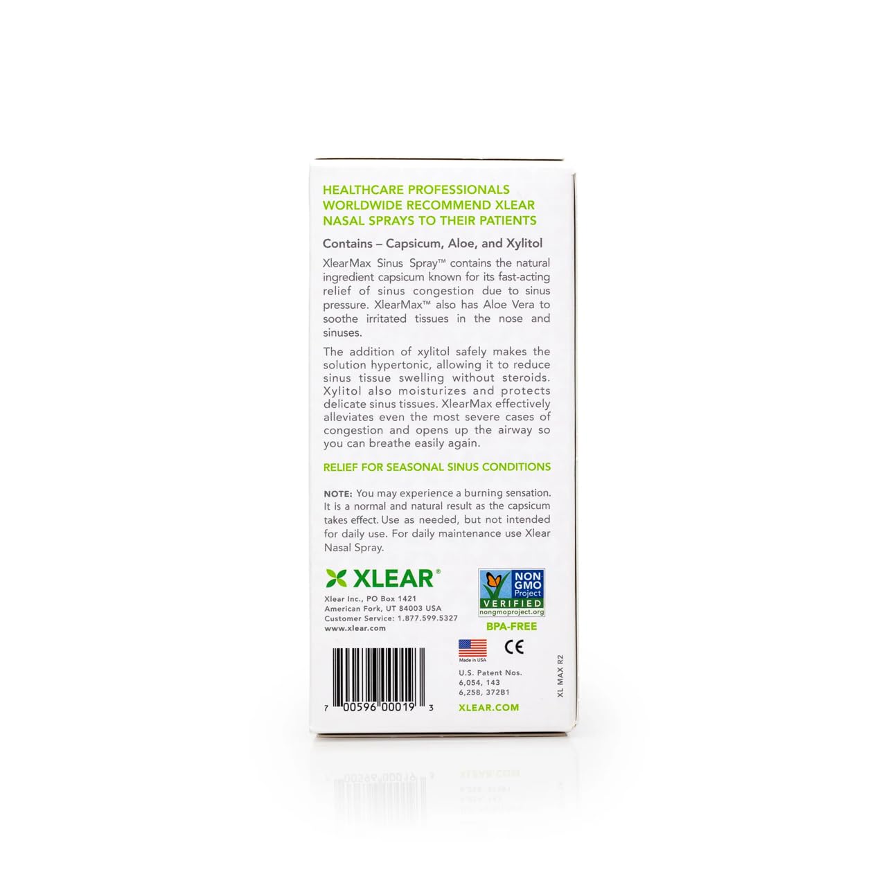 Close-up of Xlear nasal spray dispense action delivering a fine mist