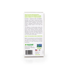 Close-up of Xlear nasal spray dispense action delivering a fine mist