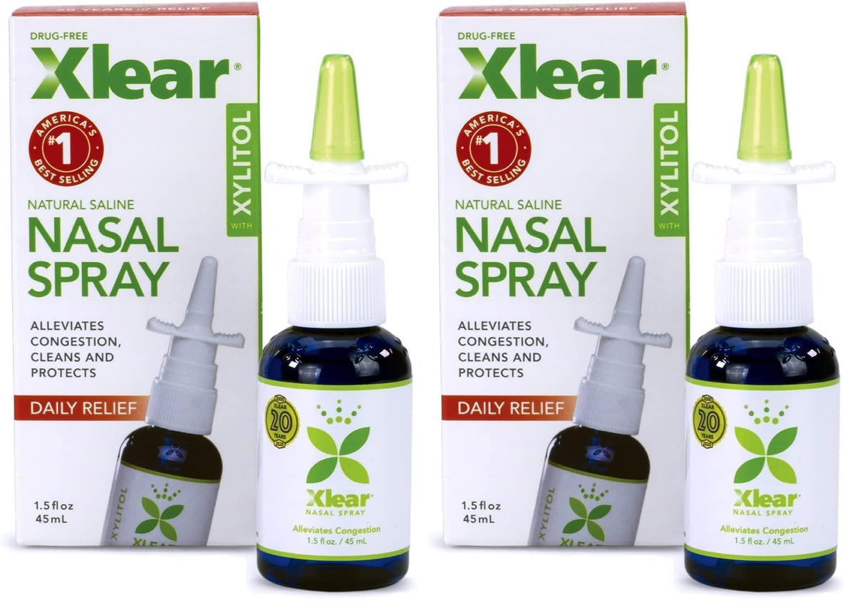 Xlear Natural Nasal Spray bottle closeup showing xylitol formula for congestion relief