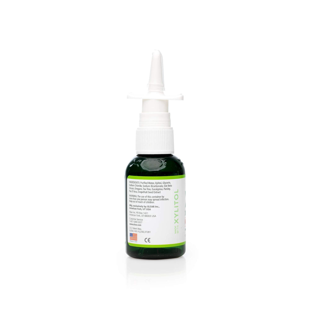 Xlear Rescue bottle demonstrates washing away pollutants for cleaner nasal passages