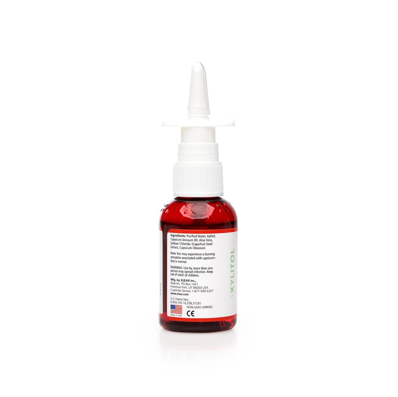 Close-up of Xlear xylitol nasal spray label and bottle detail for all-natural care
