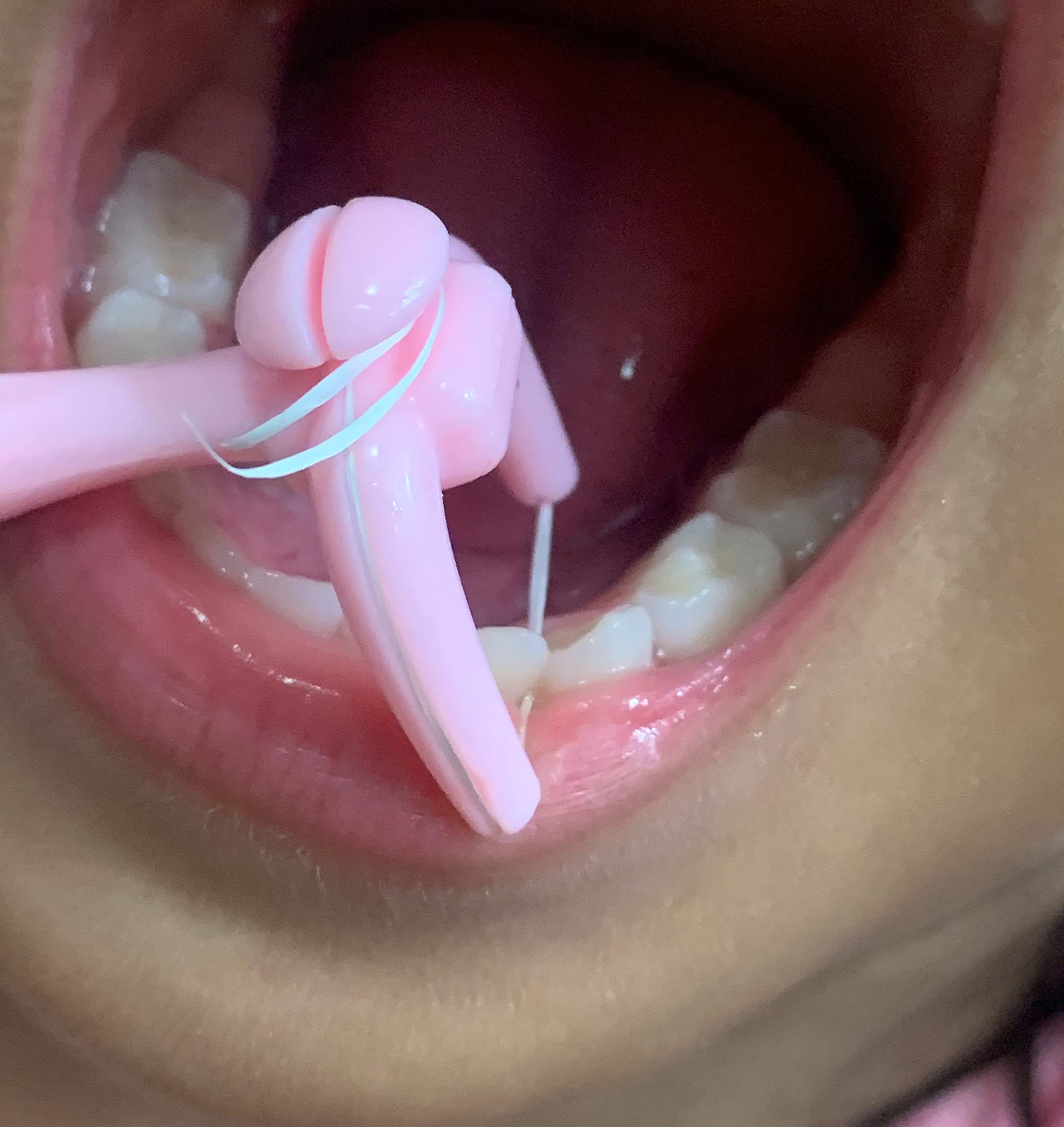 Kids-sized colorful floss holder
