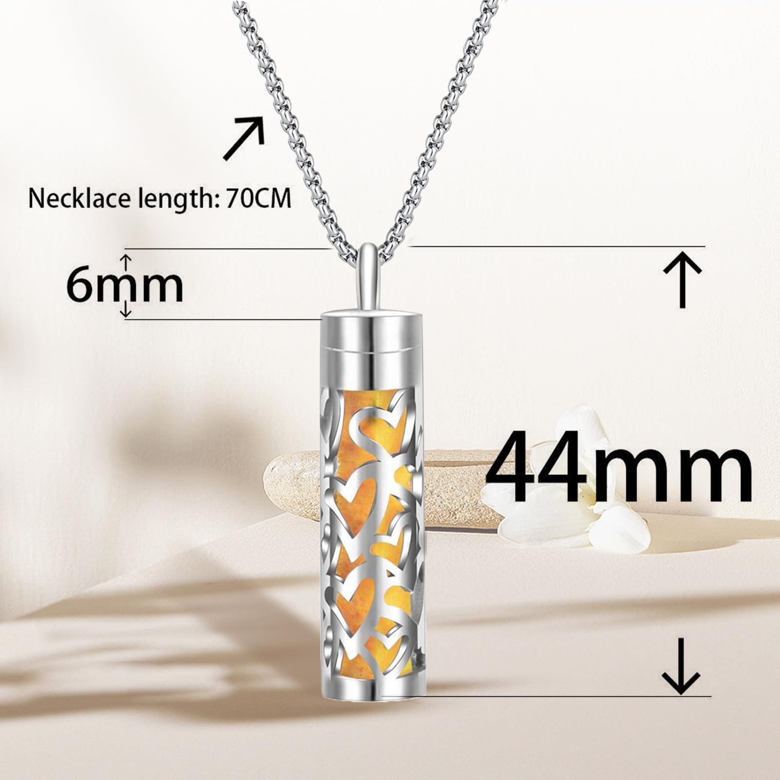 Heart-shaped scent pendant compatible with refill pads