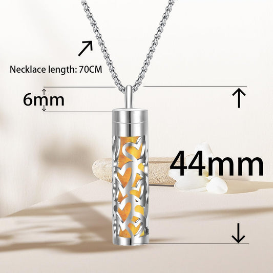 Heart-shaped scent pendant compatible with refill pads