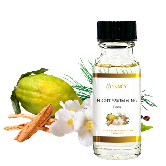 YANCY Night Swimming fragrance oil bottle (1/2 oz) with marine and floral notes