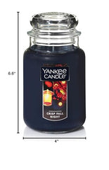 Yankee Candle Crisp Fall Night jar side view highlights premium 22oz burn time.