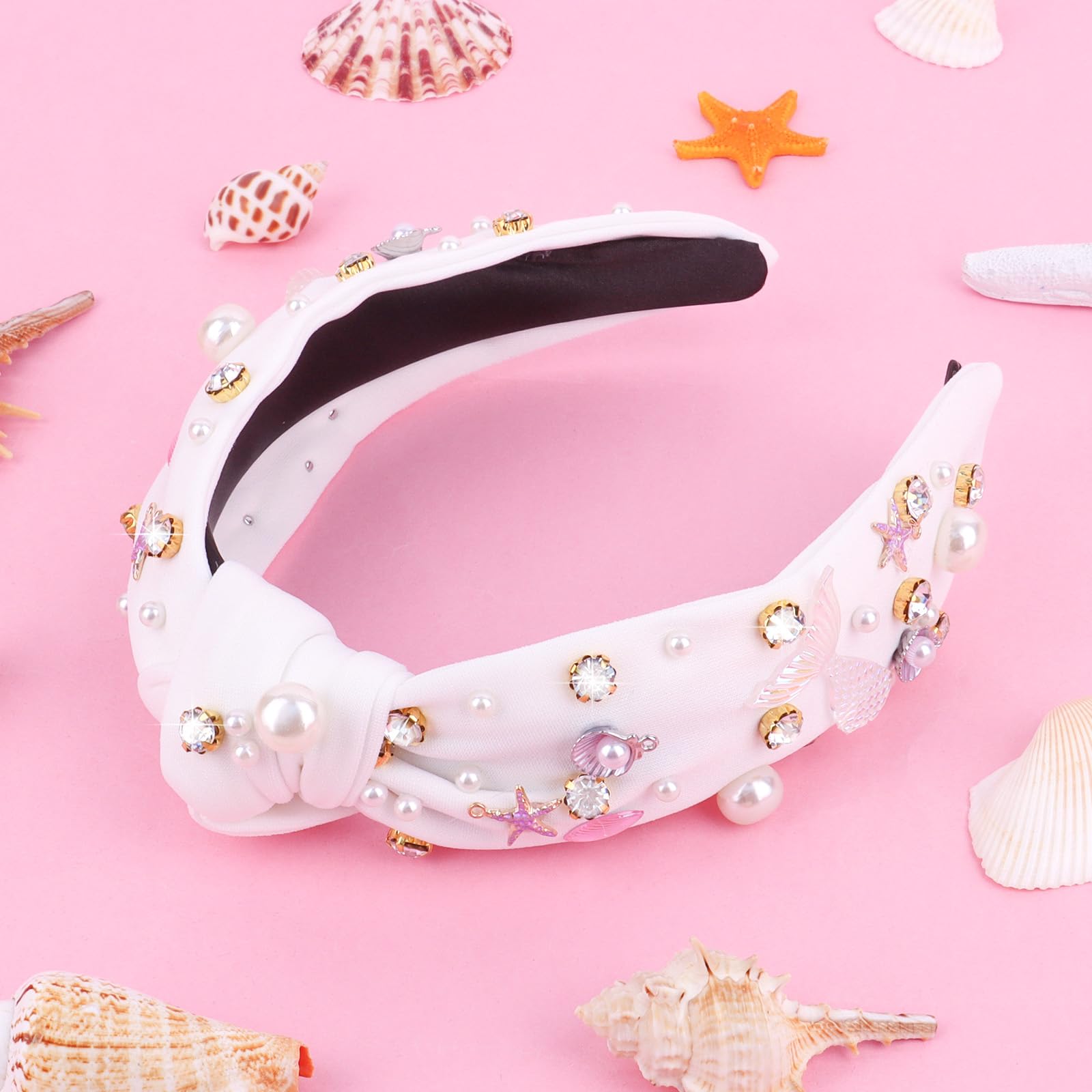 Crystal mermaid tail design on the headband catching light at parties.