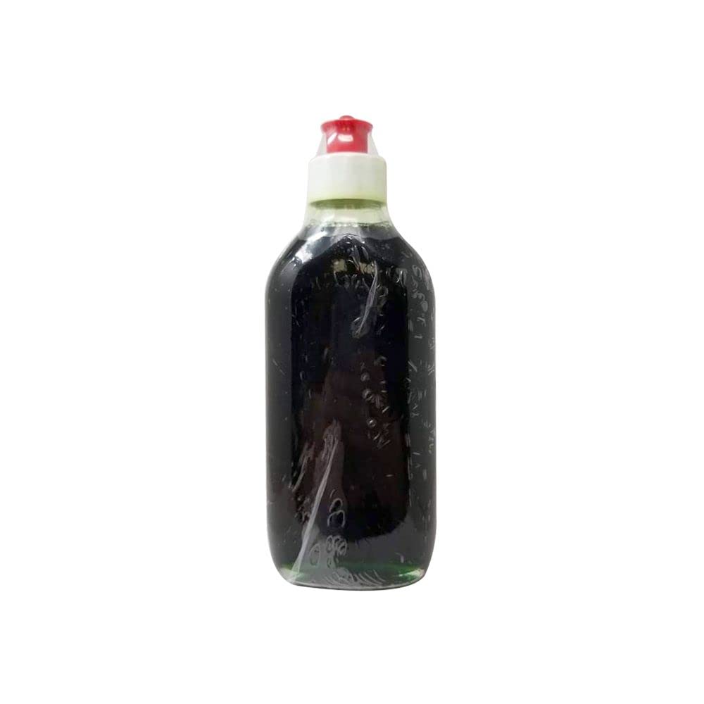 Close-up of Yeegfeyuu EFFICASCENT Oil 235ml bottle with label