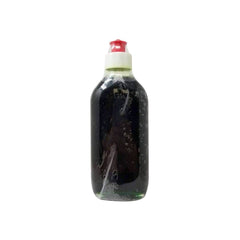 Close-up of Yeegfeyuu EFFICASCENT Oil 235ml bottle with label