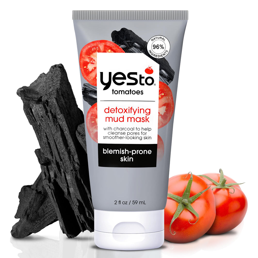 Yes To Tomatoes detoxifying charcoal mud mask jar close-up.