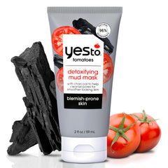 Yes To Tomatoes detoxifying charcoal mud mask jar close-up.