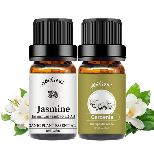 Jasmine and Gardenia essential oil set in amber bottles