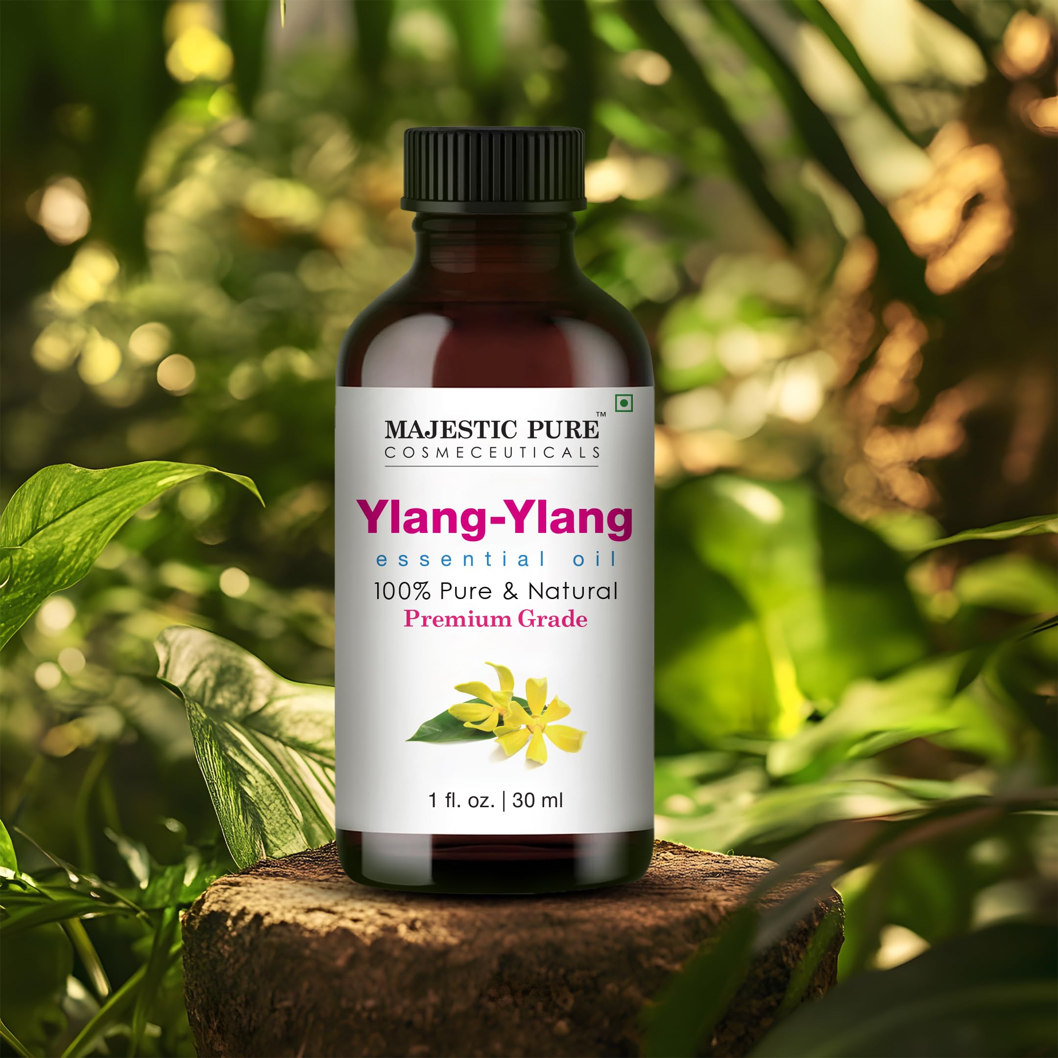 Ylang Ylang essential oil in amber glass bottle with dropper