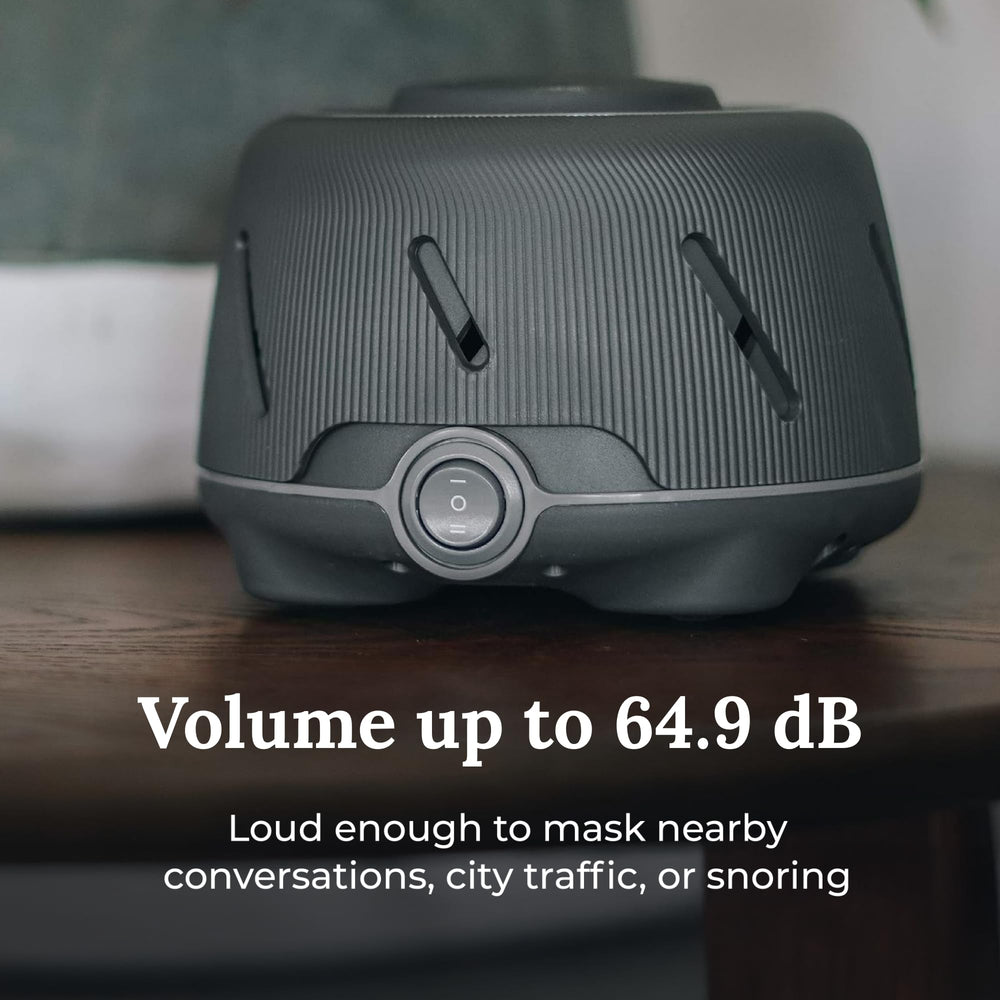 Yogasleep Dohm Charcoal bedroom setup demonstrates natural fan-based sound for calmer nights.