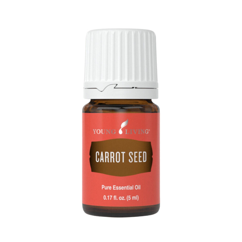 Young Living Carrot Seed Oil 5ml bottle promotes deep hydration for radiant skin.