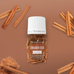 Young Living Cinnamon Bark Vitality over dish as spicy flavor enhancer.