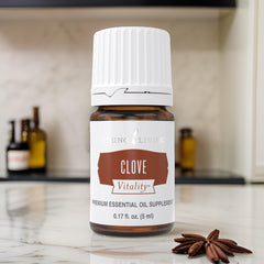 Young Living Clove Vitality spice rack showcases versatile culinary oil.