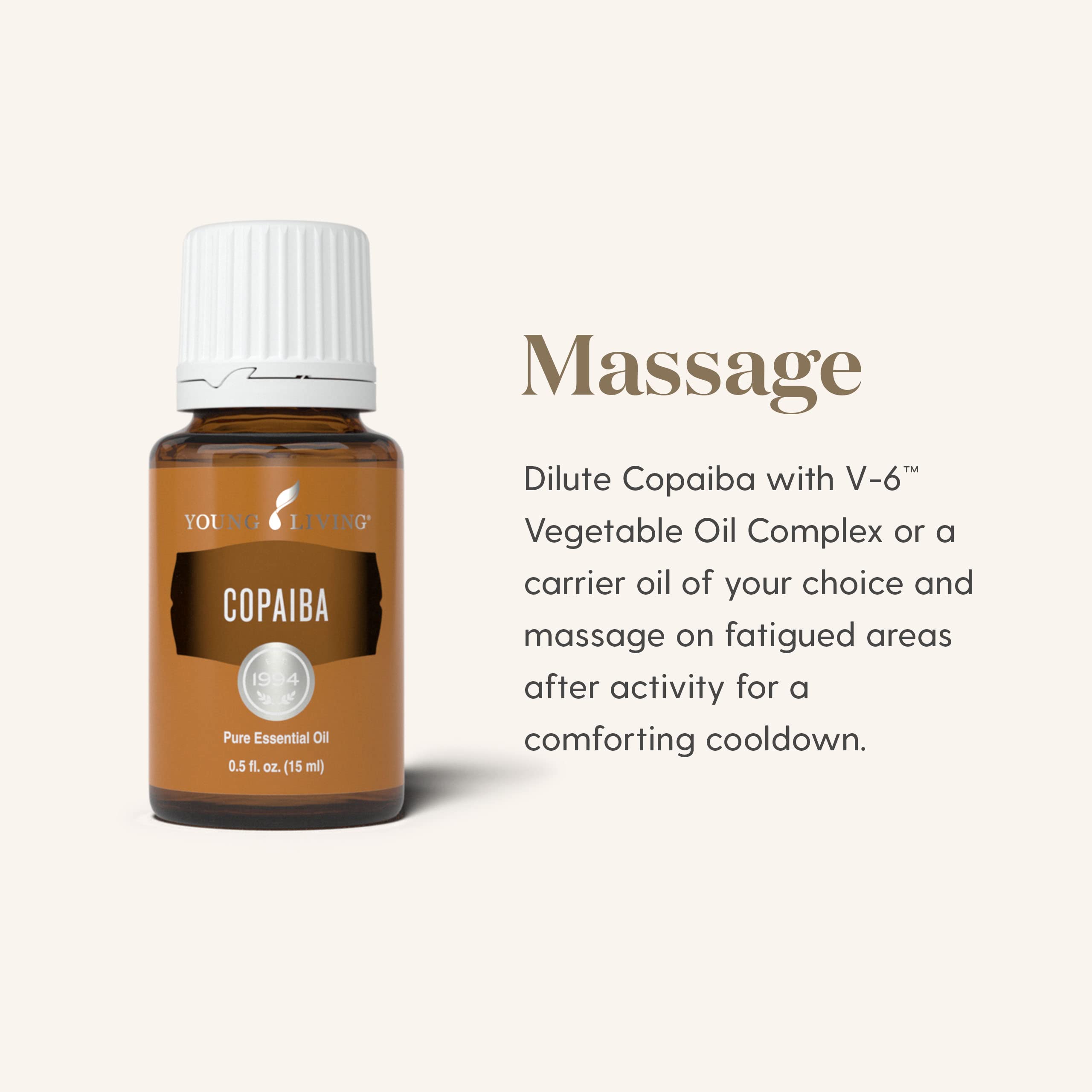 Young Living Copaiba Essential Oil applied to tense shoulders suggesting gentle muscle relief.