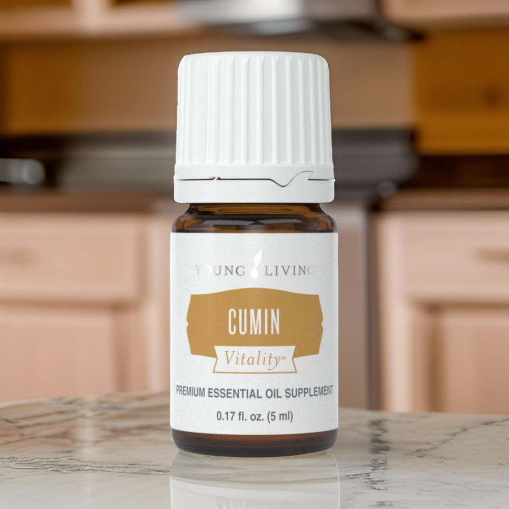 Young Living Cumin Vitality seasoning drizzle over finished dish.